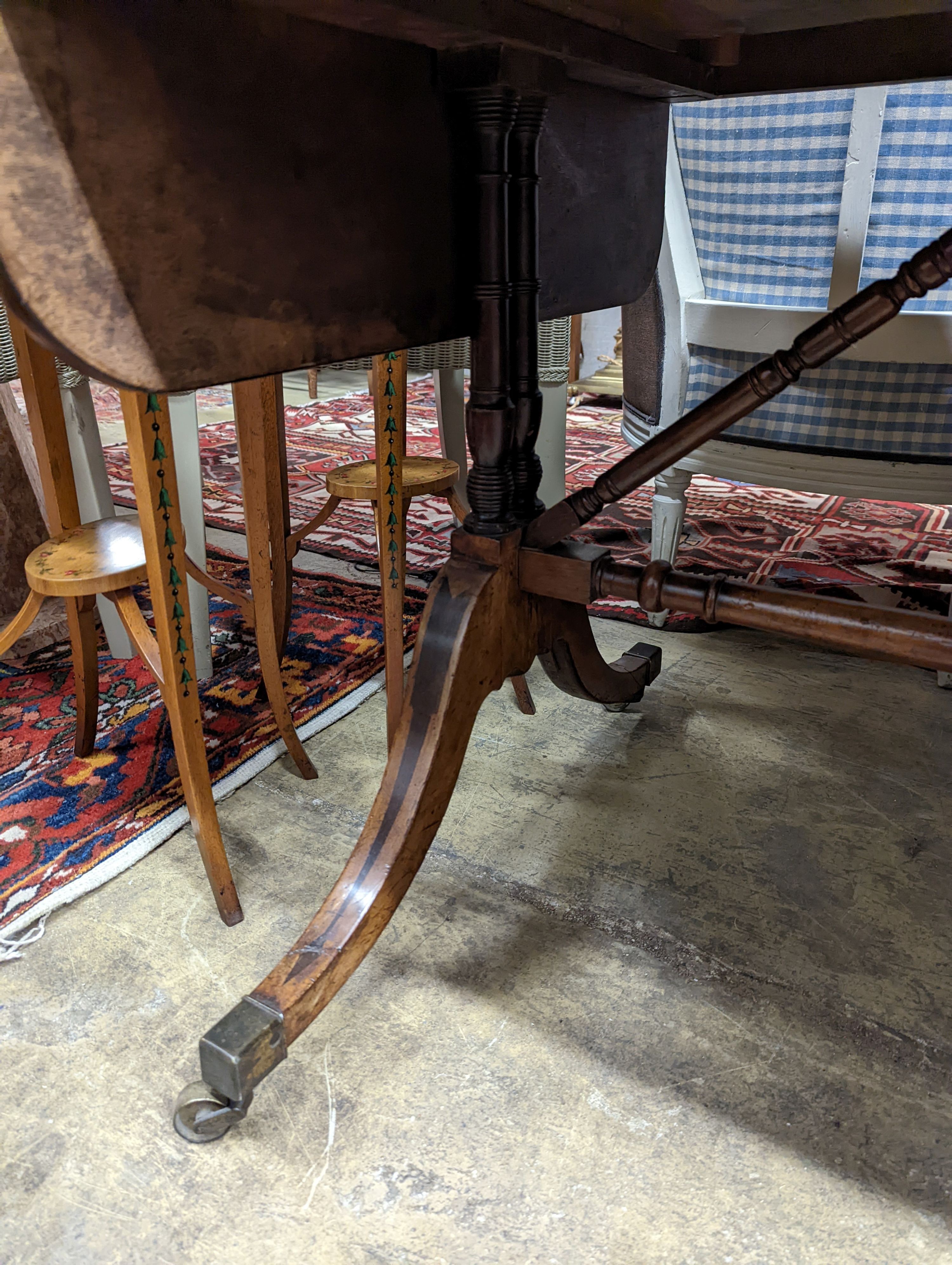 A Regency ebony inlaid mahogany sofa table, width 98cm, depth 69cm, height 72cm